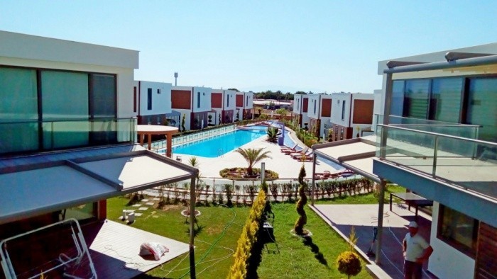 РОСКОШНАЯ ОТДЕЛЬНАЯ ВИЛЛА С ЧАСТНЫМ УЧАСТКОМ В КУШАДАСЫ.