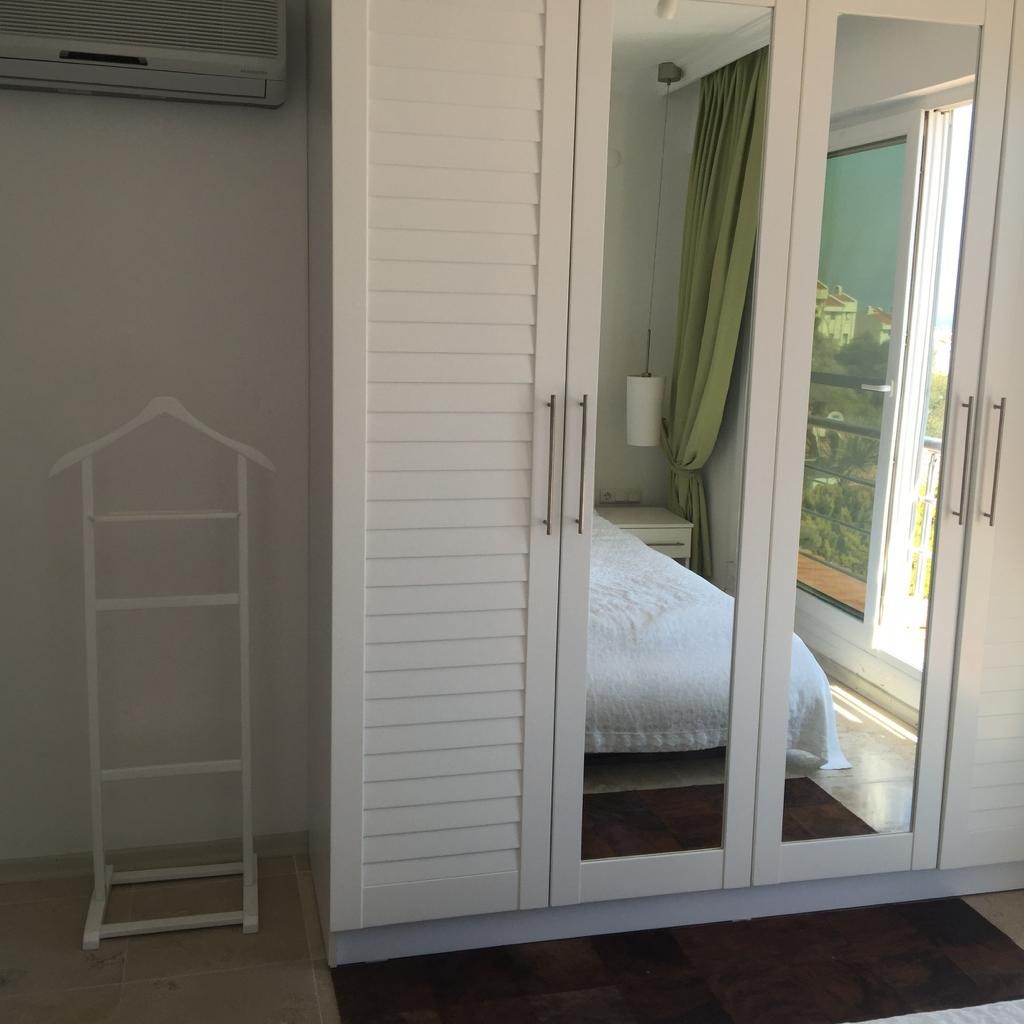 ВИЛЛА С ВИДОМ НА МОРЕ НА ПЕРВОЙ БЕРЕГОВОЙ ЛИНИИ В КУШАДАСЫ.