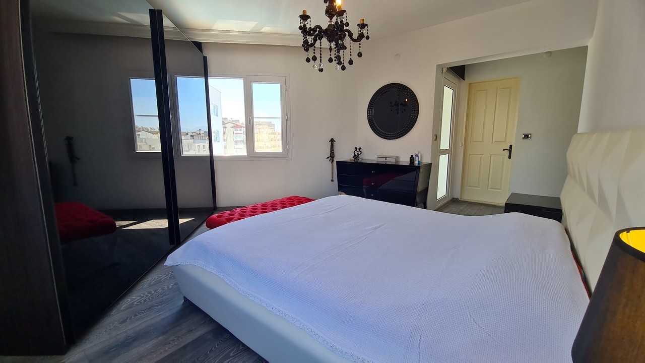 ДВУХУРОВНЕВАЯ КВАРТИРА С ВИДОМ НА МОРЕ НА ПРОДАЖУ В КУШАДАСЫ.