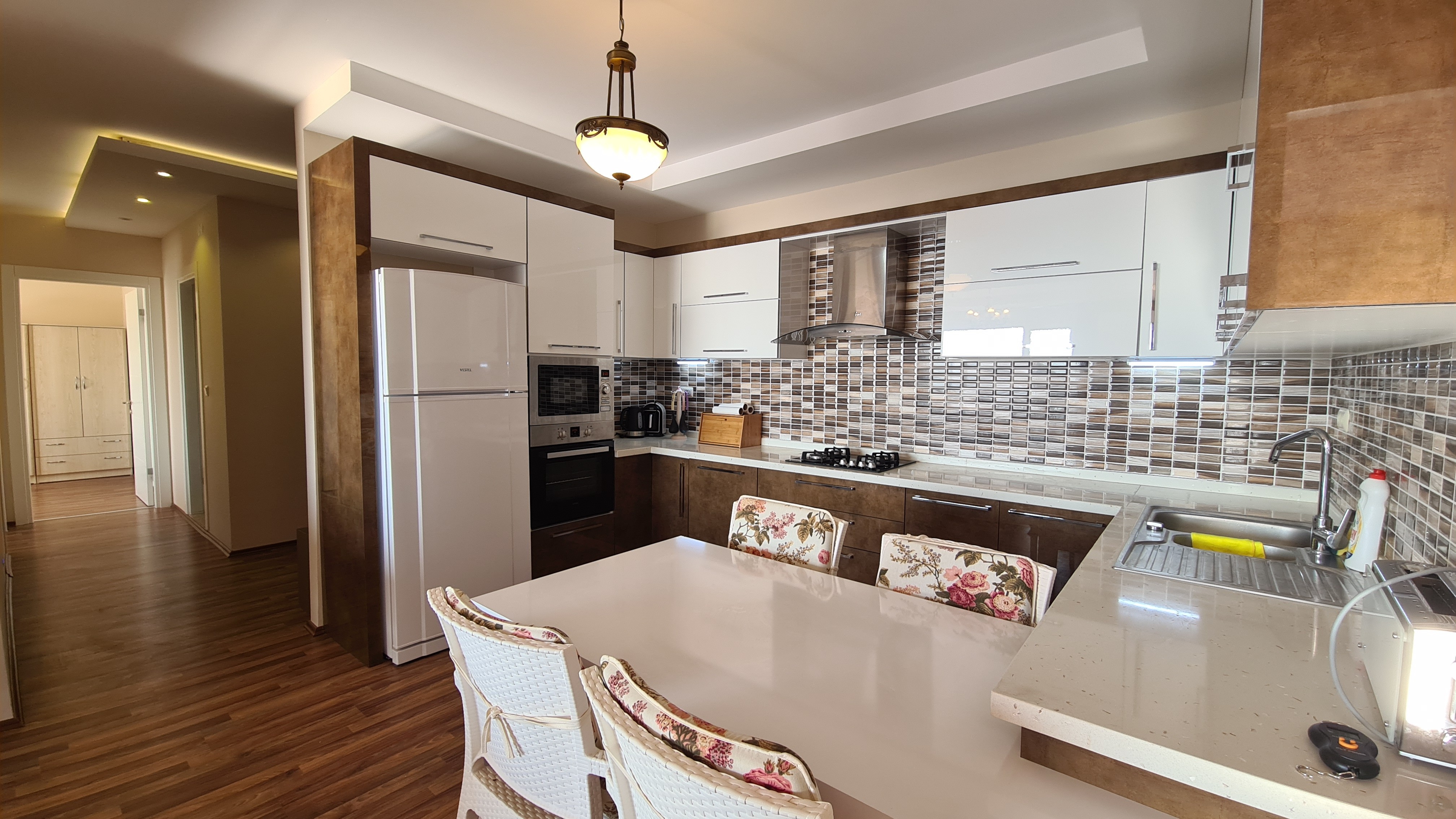 КВАРТИРА 3+1 С ПАНОРАМНЫМ ВИДОМ НА МОРЕ В КУШАДАСЫ.