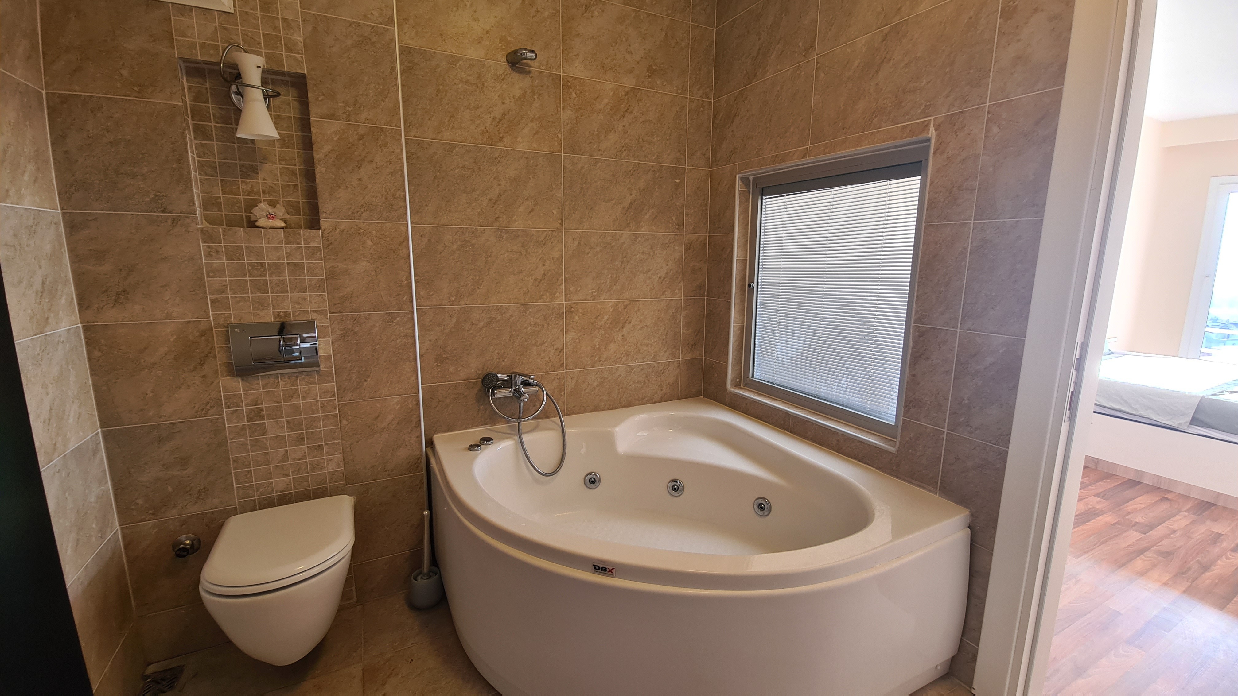 КВАРТИРА 3+1 С ПАНОРАМНЫМ ВИДОМ НА МОРЕ В КУШАДАСЫ.