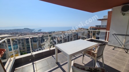 КВАРТИРА 3+1 С ПАНОРАМНЫМ ВИДОМ НА МОРЕ В КУШАДАСЫ.