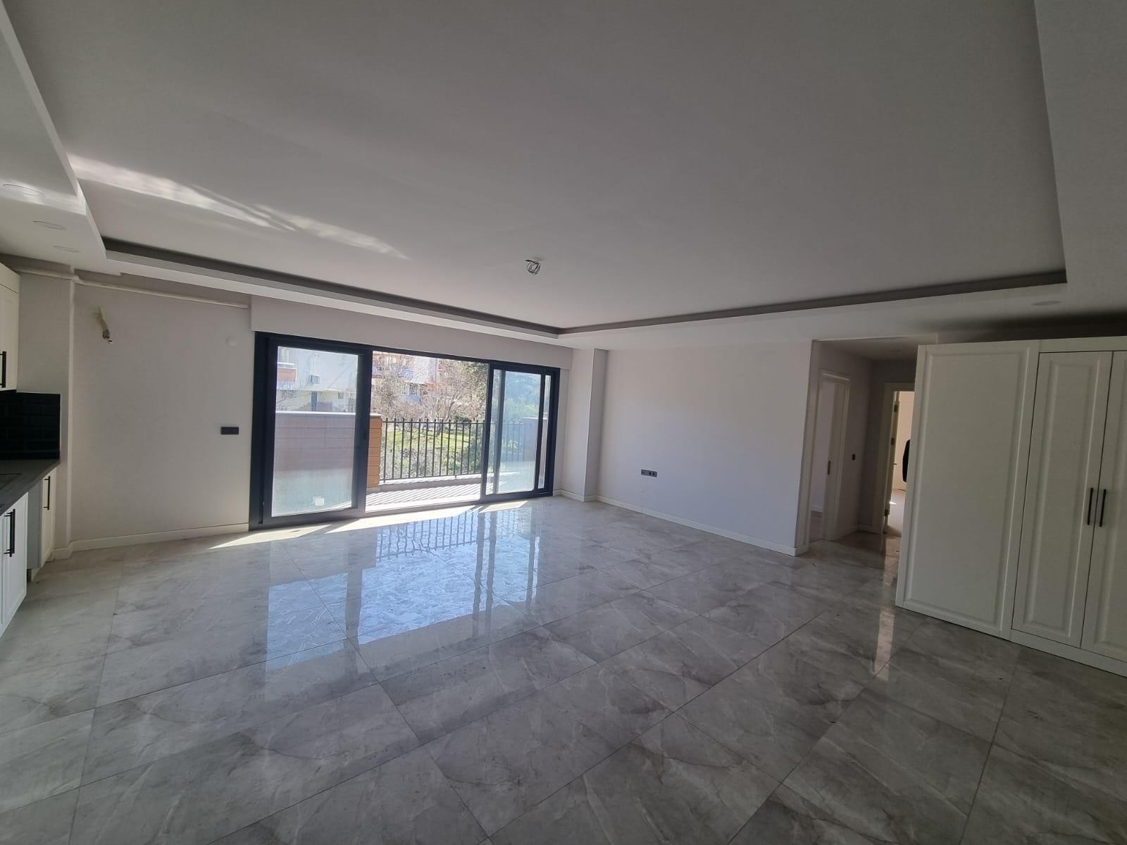 Prime Location in Kuşadası! Modern 2+1 Apartment with Pool and Security