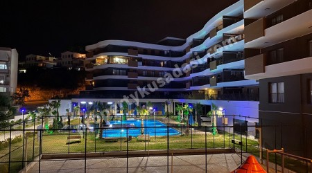 Prime Location in Kuşadası! Modern 2+1 Apartment with Pool and Security