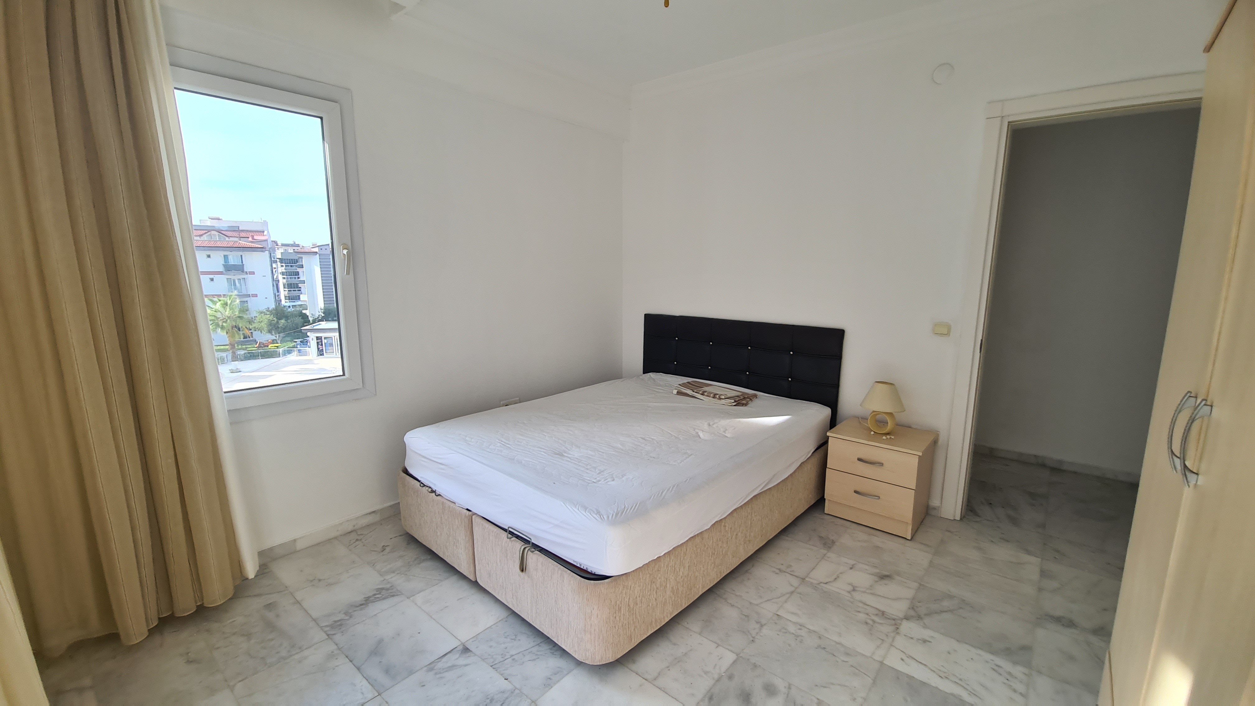 Comfortable 3+1 Apartment for Sale in a Secure Poolside Site in Kuşadası