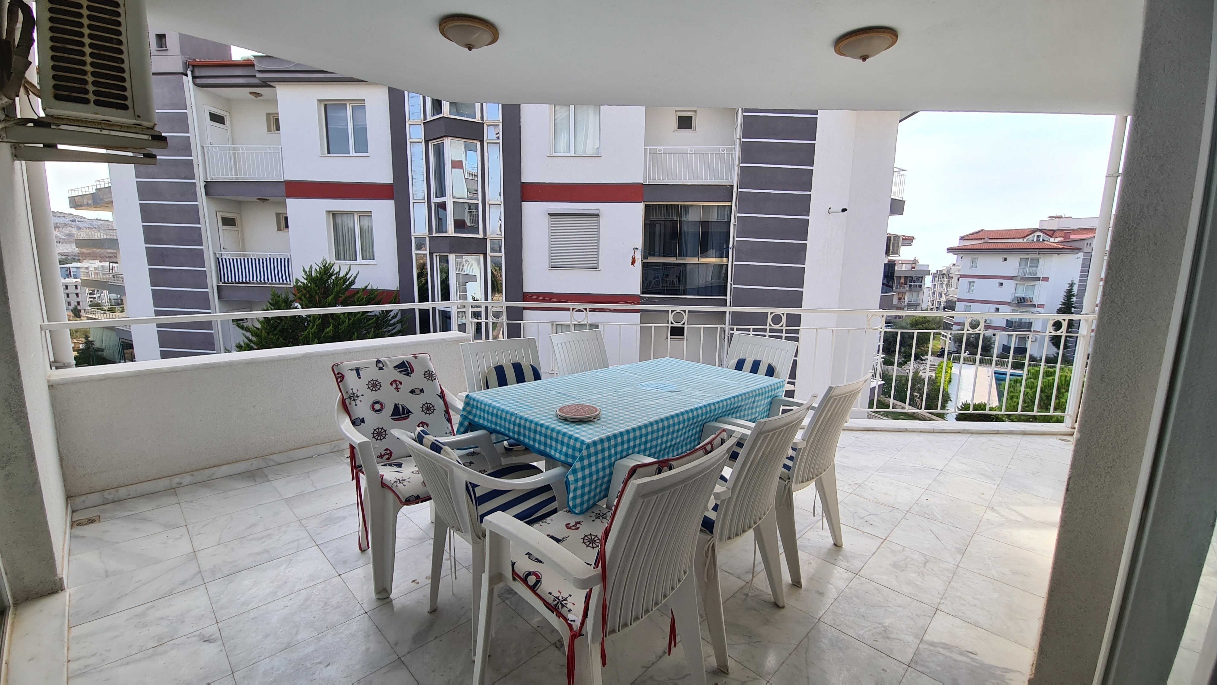Comfortable 3+1 Apartment for Sale in a Secure Poolside Site in Kuşadası