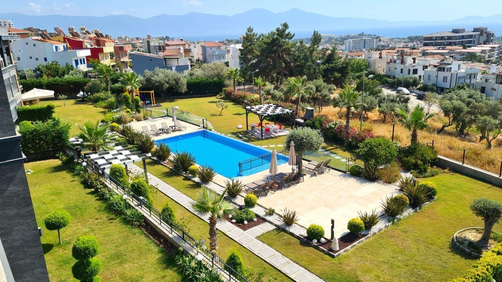 For sale: a two-room residence apartment with a full sea view in Kuşadası.