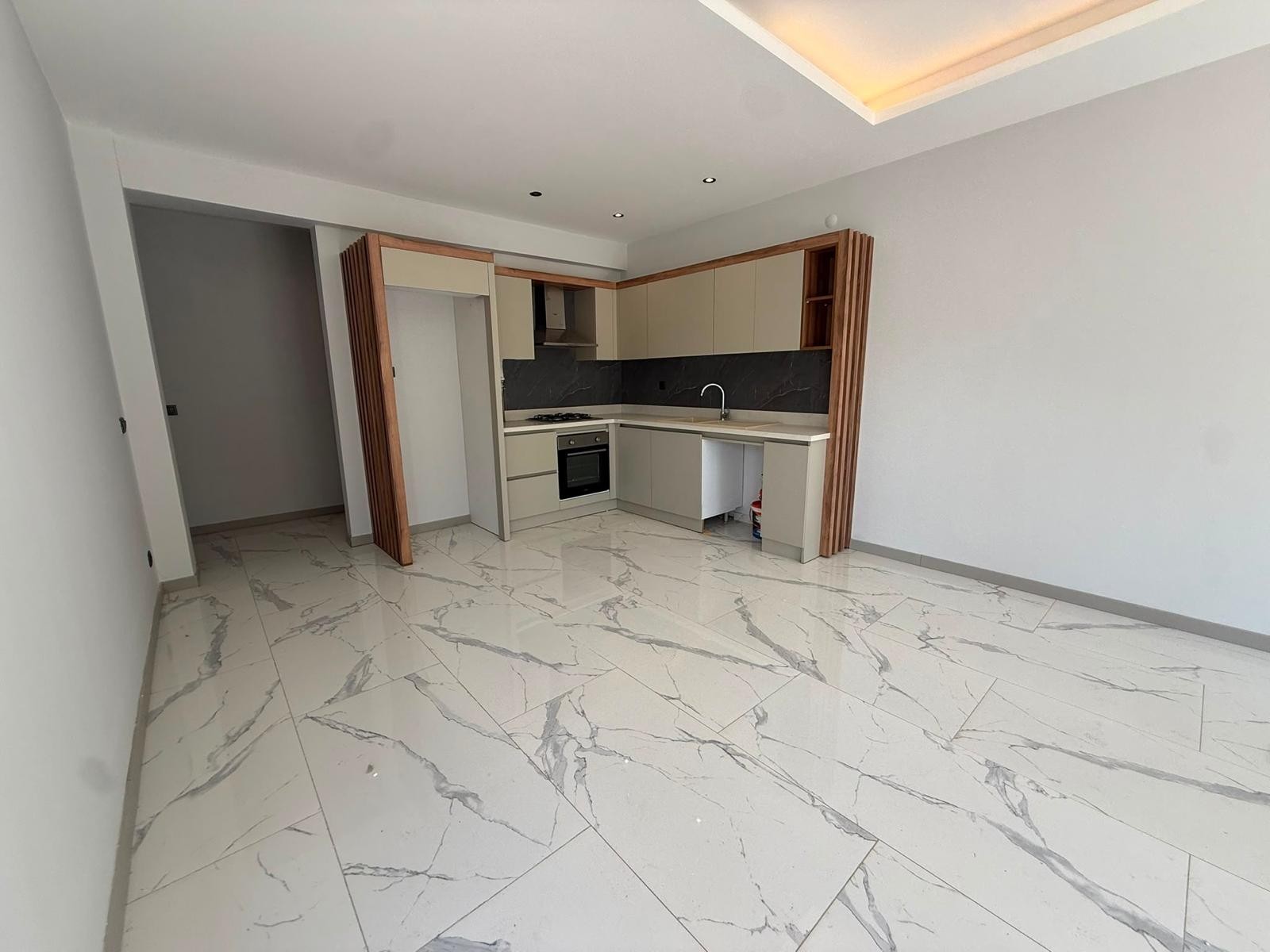 FOR SALE IN KUŞADASI | PRIVATE GARDEN 2+1 | 75 SQM | 50 SQM GARDEN & TERRACE | INDOOR & OUTDOOR POOLS