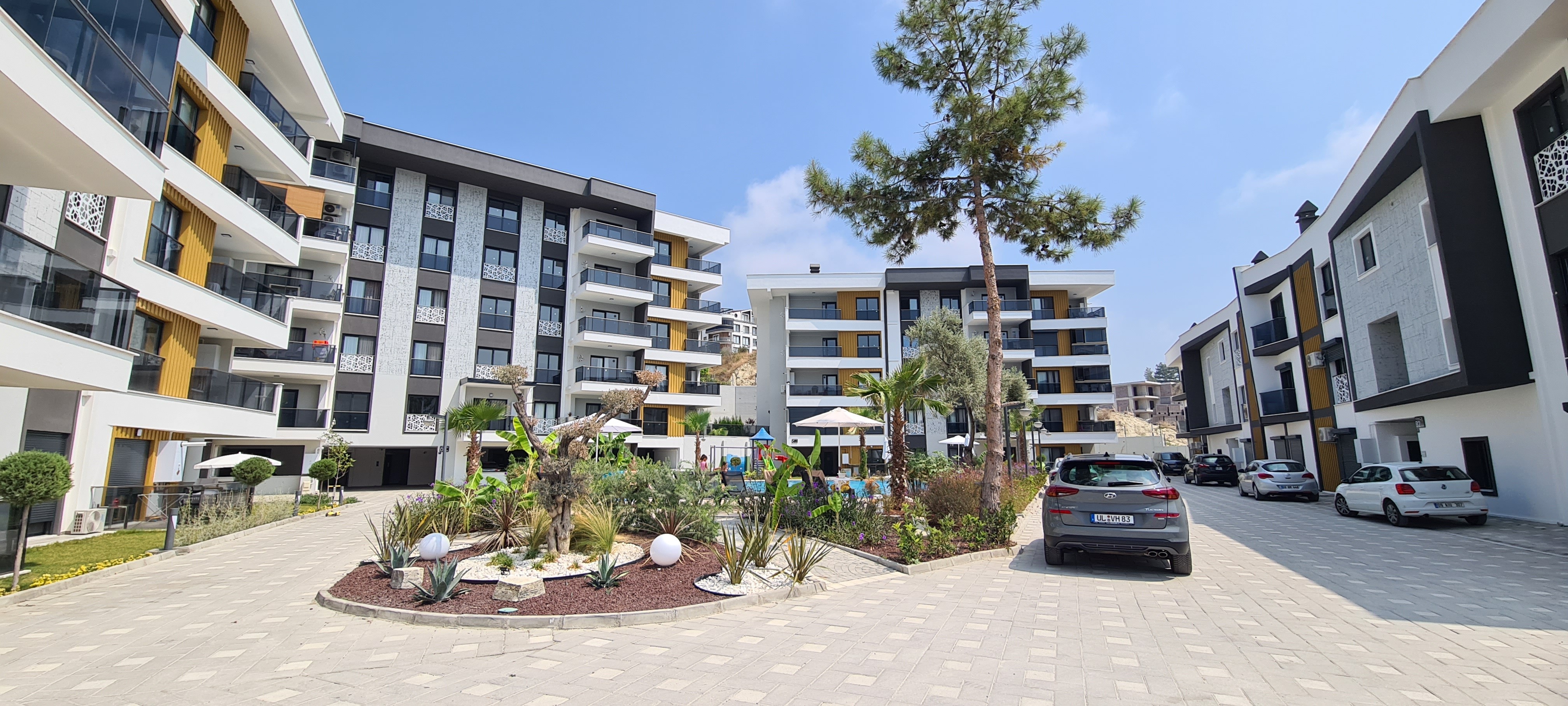 FOR SALE IN KUŞADASI | PRIVATE GARDEN 2+1 | 75 SQM | 50 SQM GARDEN & TERRACE | INDOOR & OUTDOOR POOLS