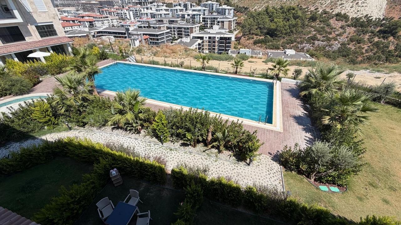 3+1 APARTMENT FOR SALE WITH MOUNTAIN AND POOL VIEWS IN DEĞİRMENDERE, KUŞADASI