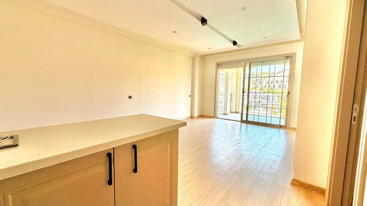 3+1 APARTMENT FOR SALE WITH MOUNTAIN AND POOL VIEWS IN DEĞİRMENDERE, KUŞADASI
