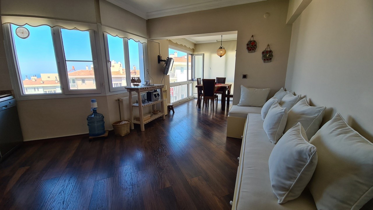 ДВУХУРОВНЕВАЯ КВАРТИРА С ВИДОМ НА МОРЕ НА ПРОДАЖУ В КУШАДАСЫ.