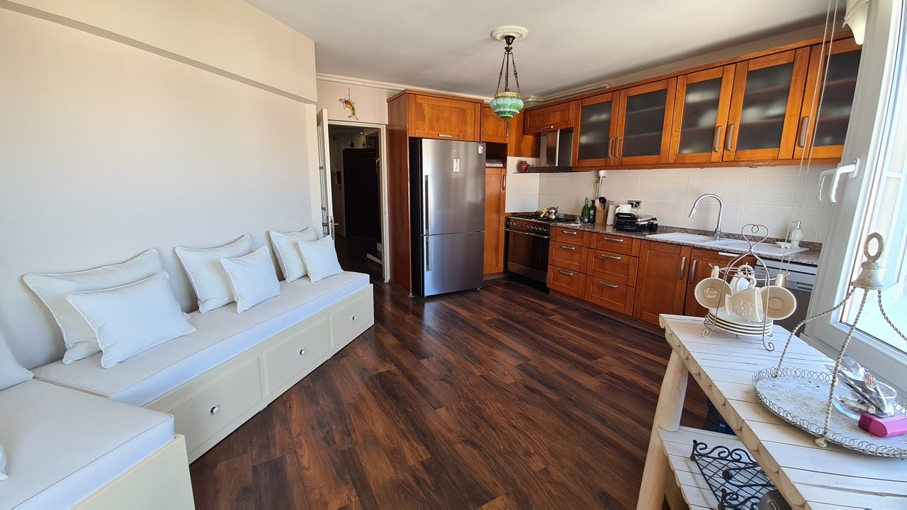 ДВУХУРОВНЕВАЯ КВАРТИРА С ВИДОМ НА МОРЕ НА ПРОДАЖУ В КУШАДАСЫ.