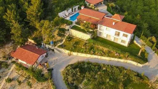 ВЕЛИКОЛЕПНЫЙ ФЕРМЕРСКИЙ ДОМ С ВИДОМ НА МОРЕ И ПРИРОДУ В КУШАДАСЫ.