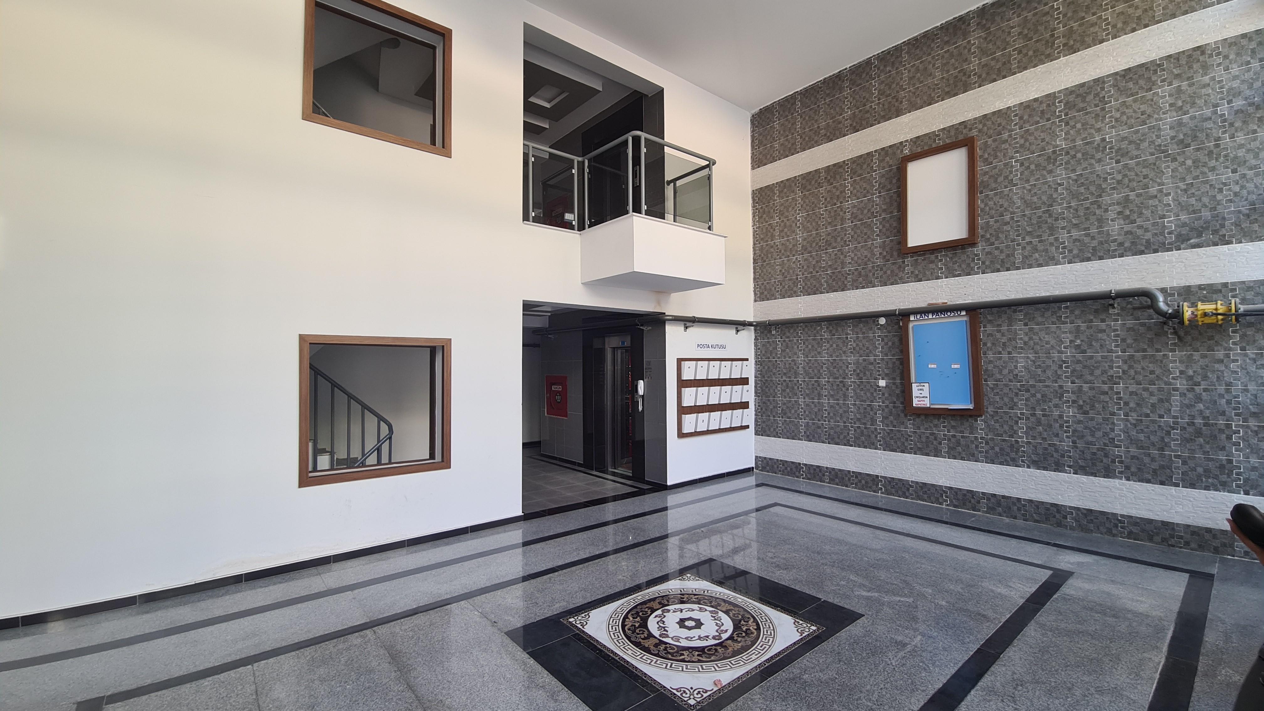 КВАРТИРА 3+1 С ПАНОРАМНЫМ ВИДОМ НА МОРЕ В КУШАДАСЫ.