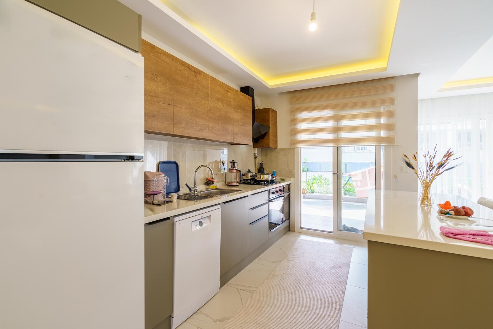 SPECIALLY DESIGNED SPACIOUS 2+1 GARDEN FLOOR