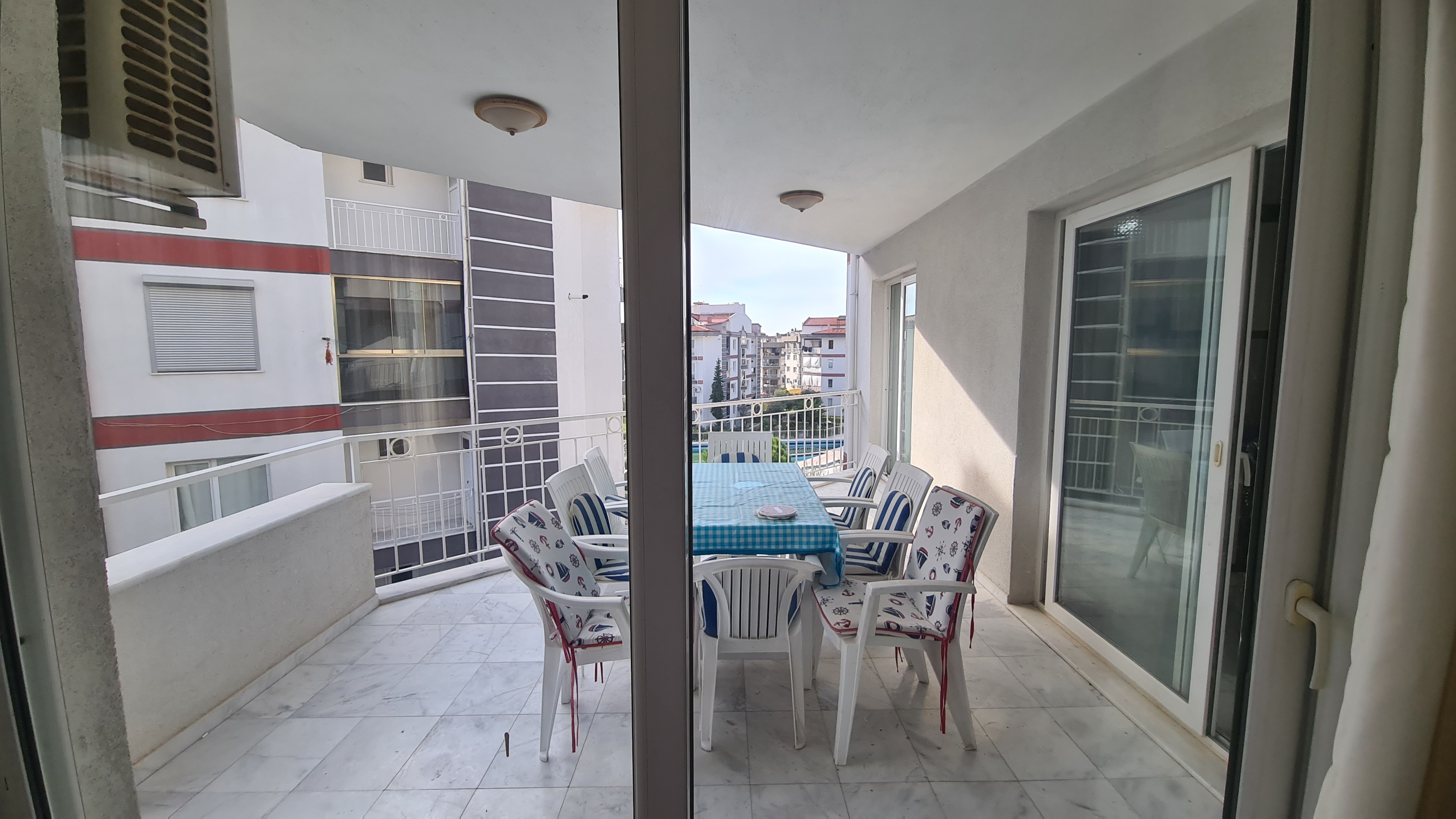 Comfortable 3+1 Apartment for Sale in a Secure Poolside Site in Kuşadası