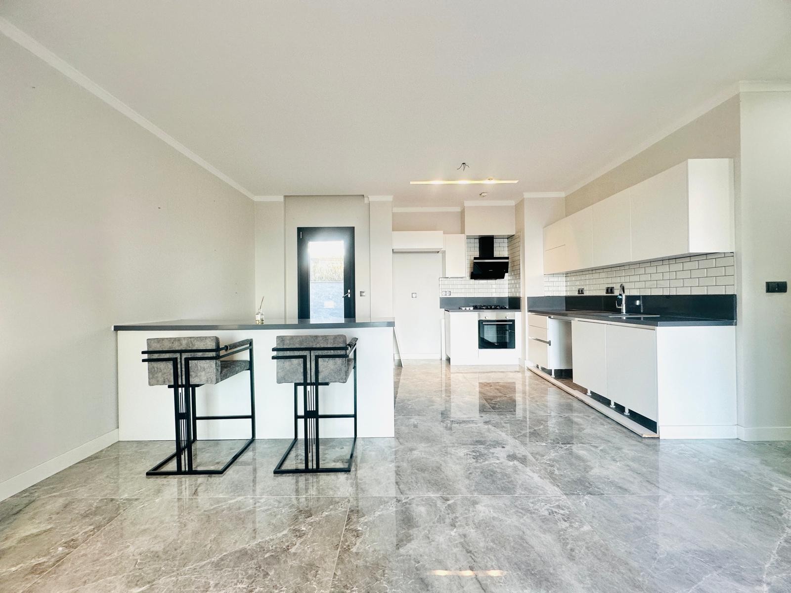 For sale: a two-room residence apartment with a full sea view in Kuşadası.