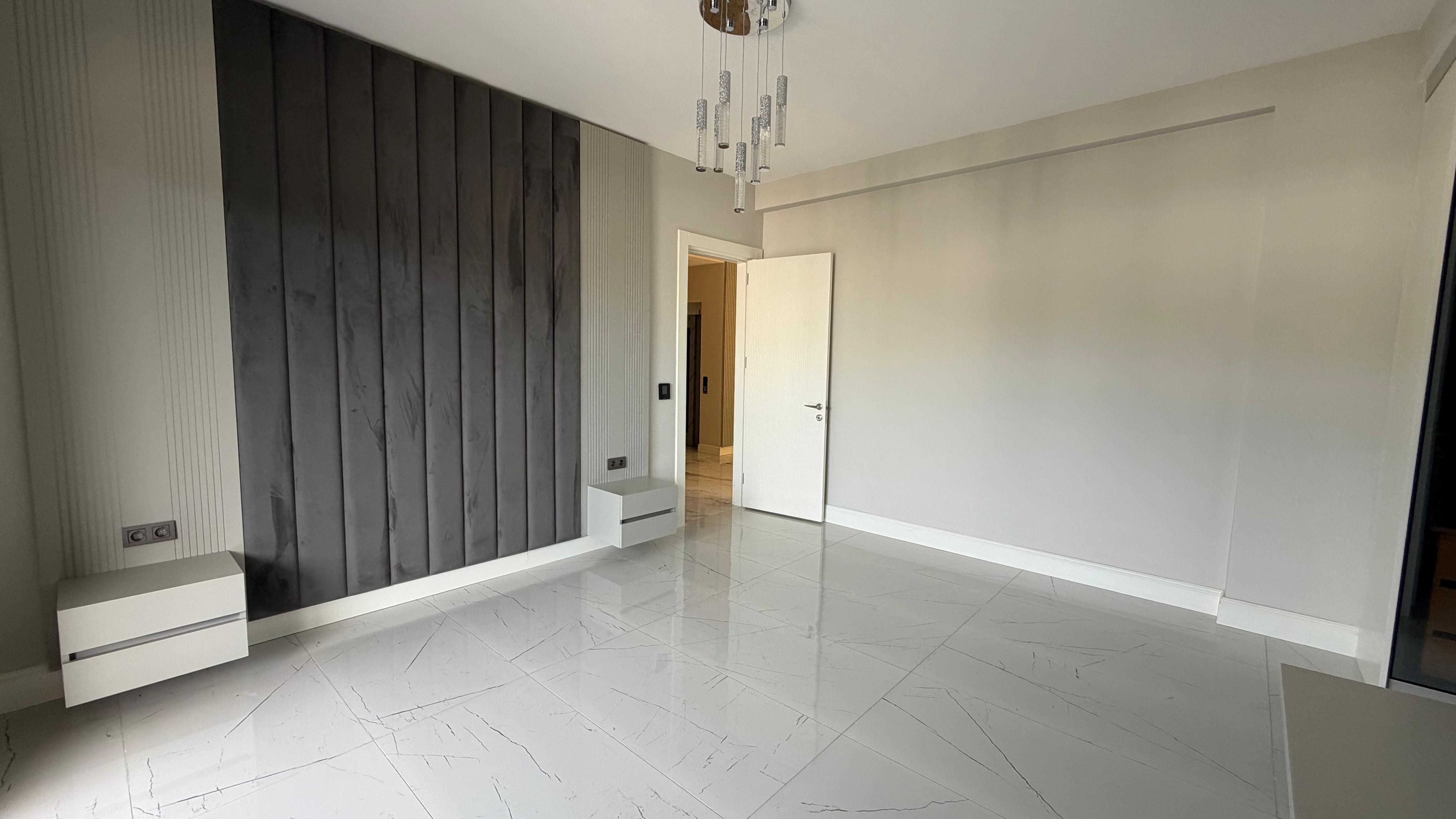 VILLA MODERNA DE LUJO EN VENTA A POCA DISTANCIA A PIE DEL MAR EN EL BARRIO DE EGE, KUŞADASI