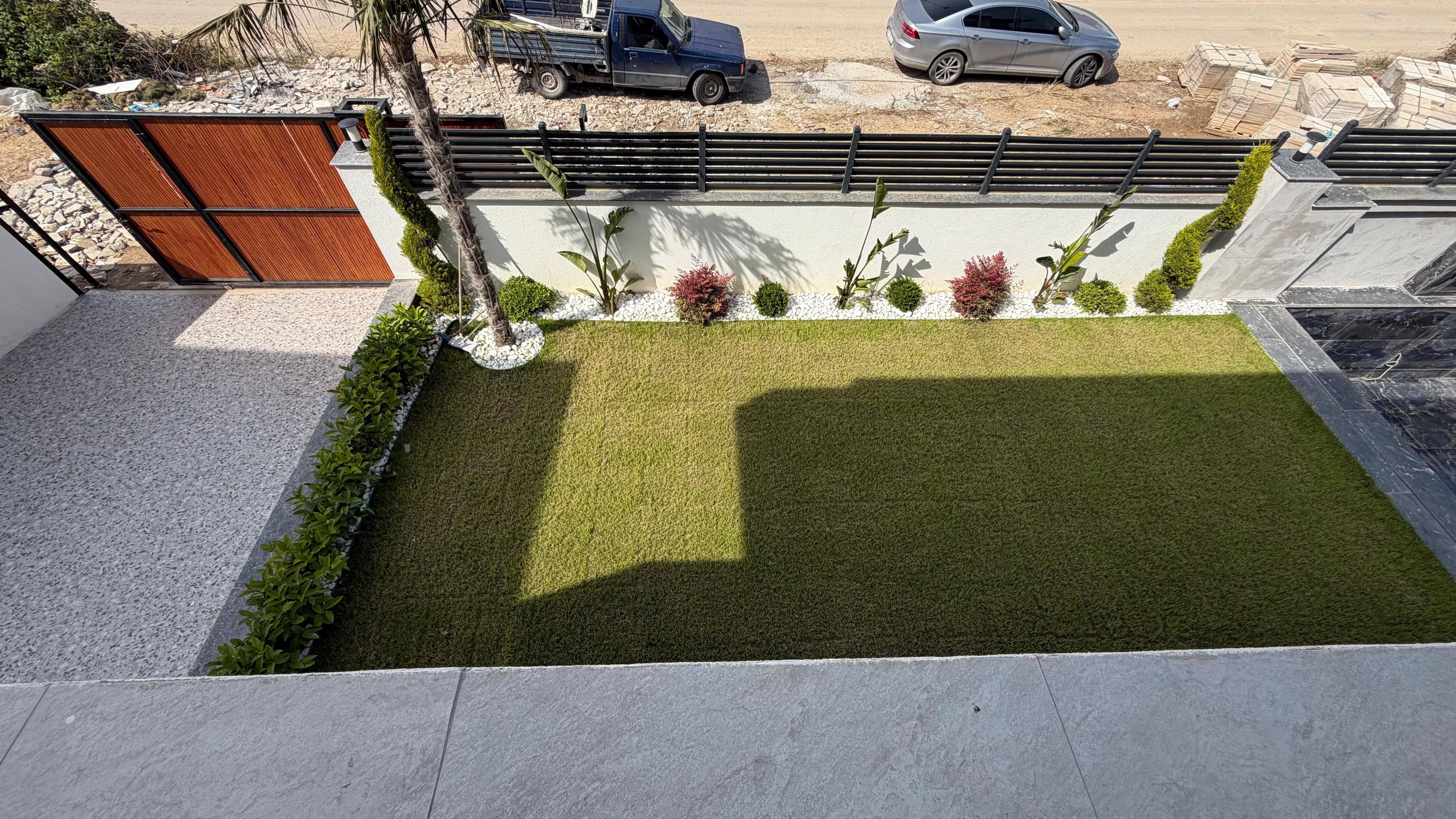 VILLA MODERNA DE LUJO EN VENTA A POCA DISTANCIA A PIE DEL MAR EN EL BARRIO DE EGE, KUŞADASI