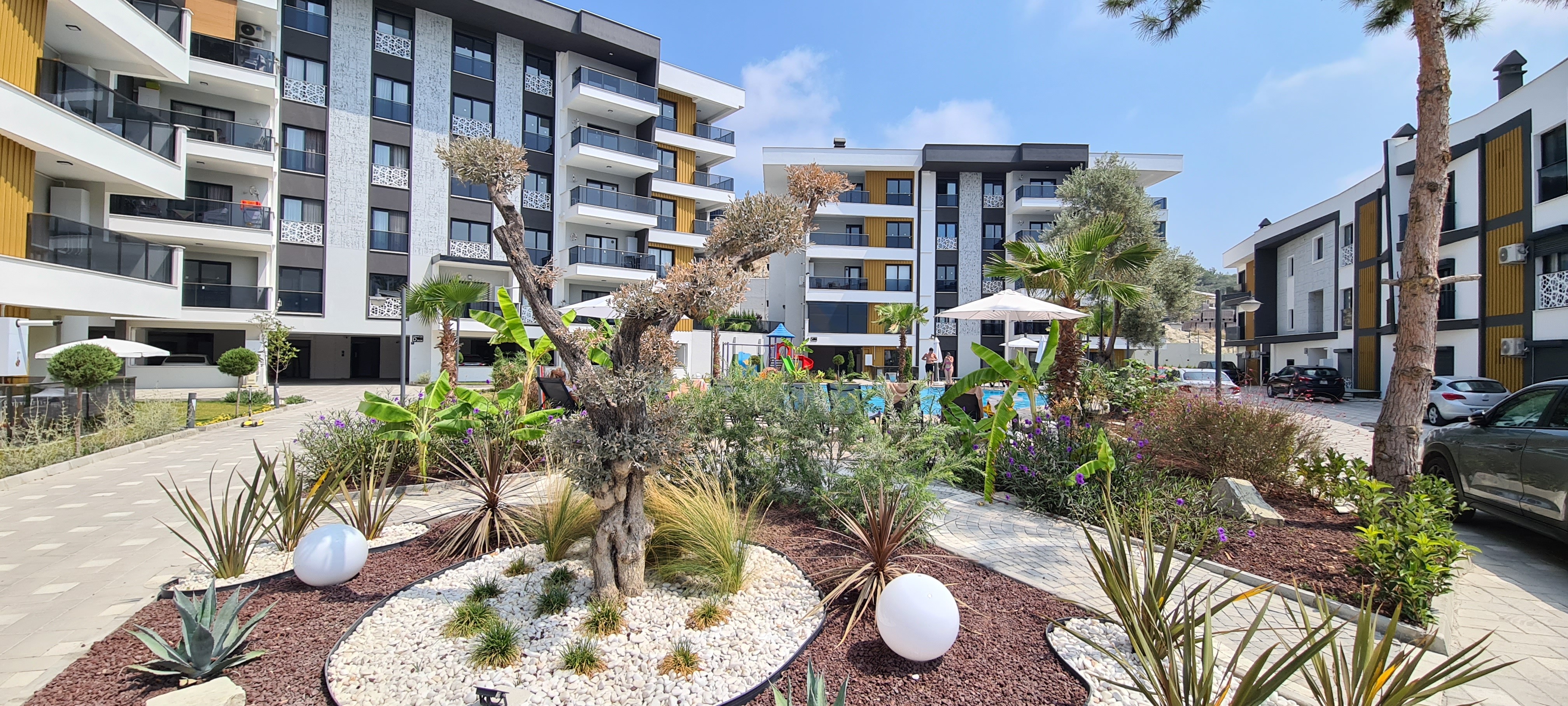 FOR SALE IN KUŞADASI | PRIVATE GARDEN 2+1 | 75 SQM | 50 SQM GARDEN & TERRACE | INDOOR & OUTDOOR POOLS